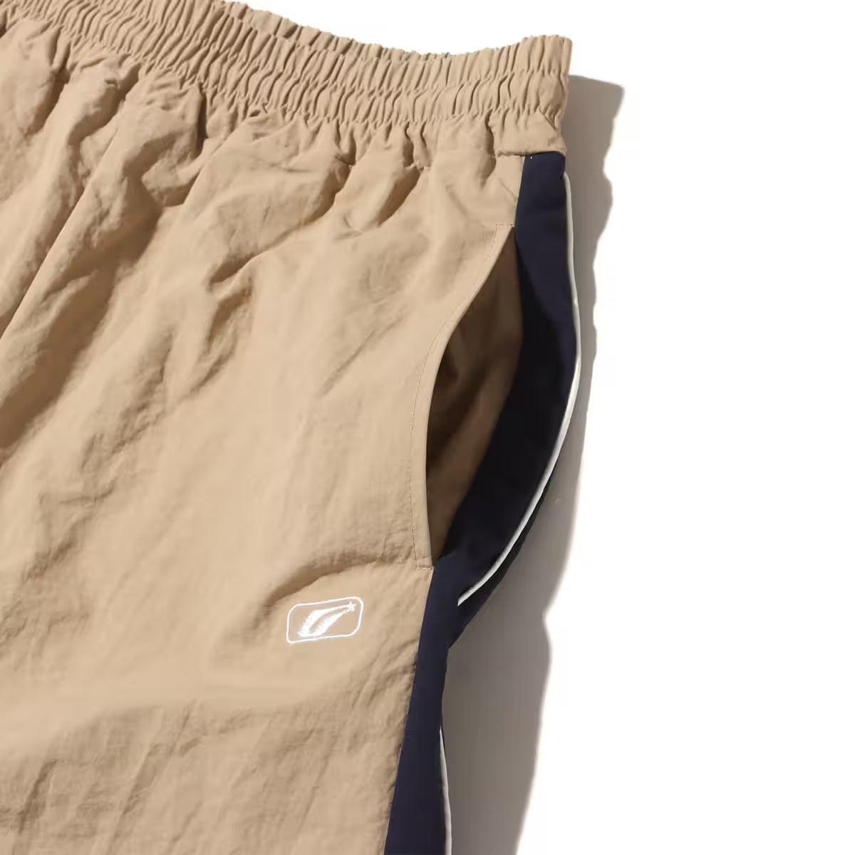 ATMOS PINK SIDE LINE NYLON PANTS