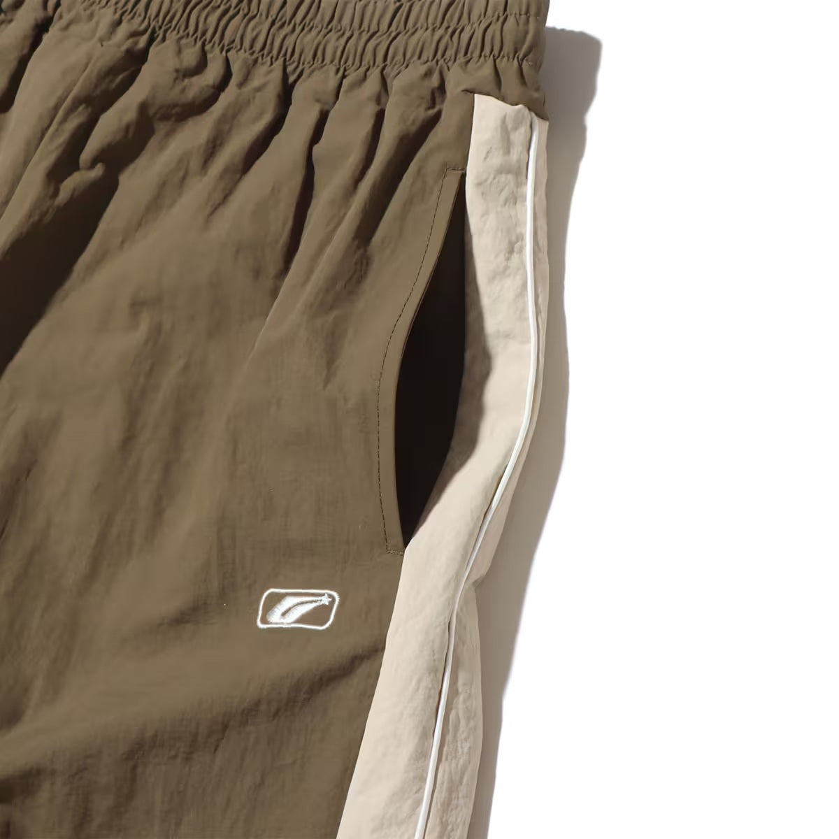 ATMOS PINK SIDE LINE NYLON PANTS