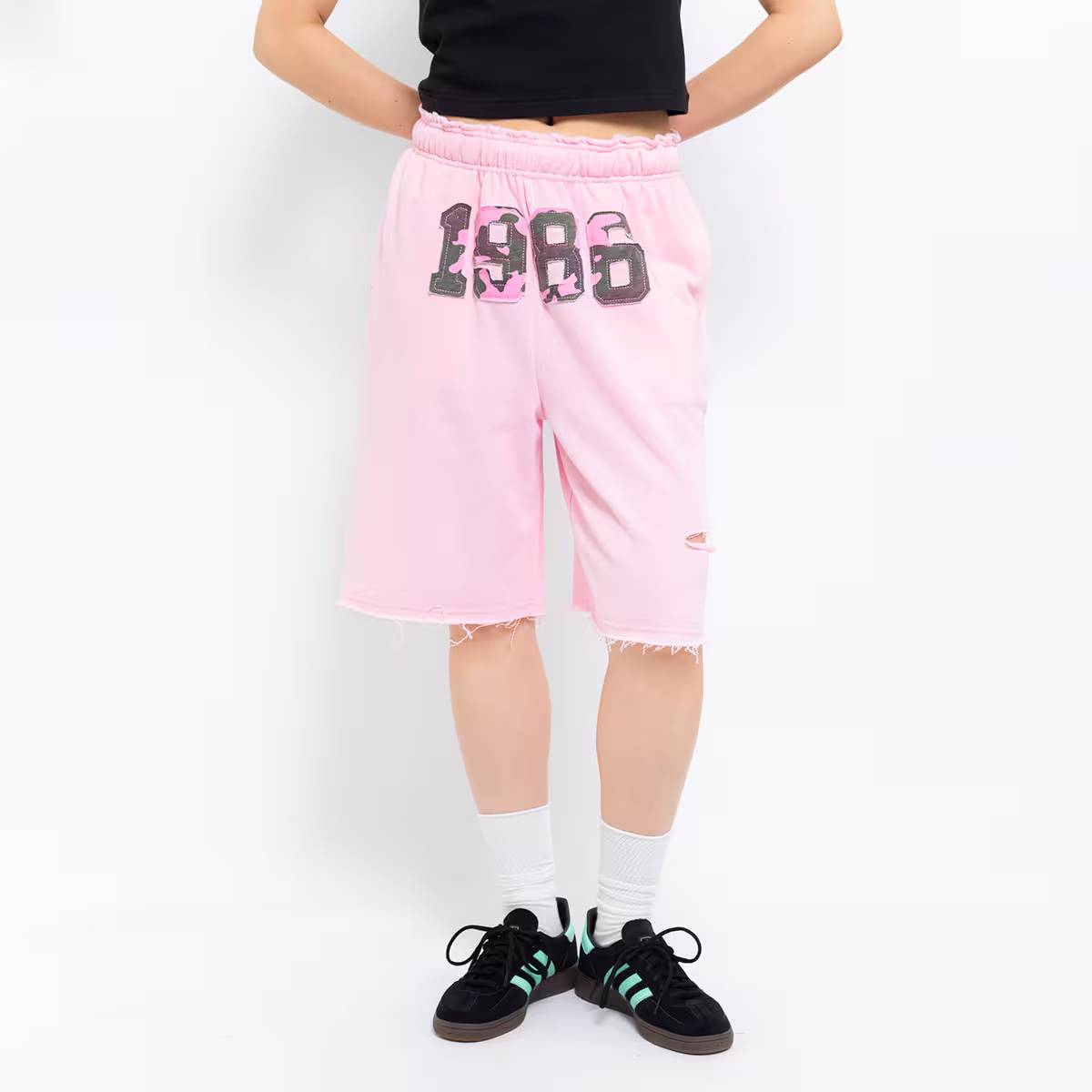 ATMOS PINK DAMAGED HALF SWEAT PANTS