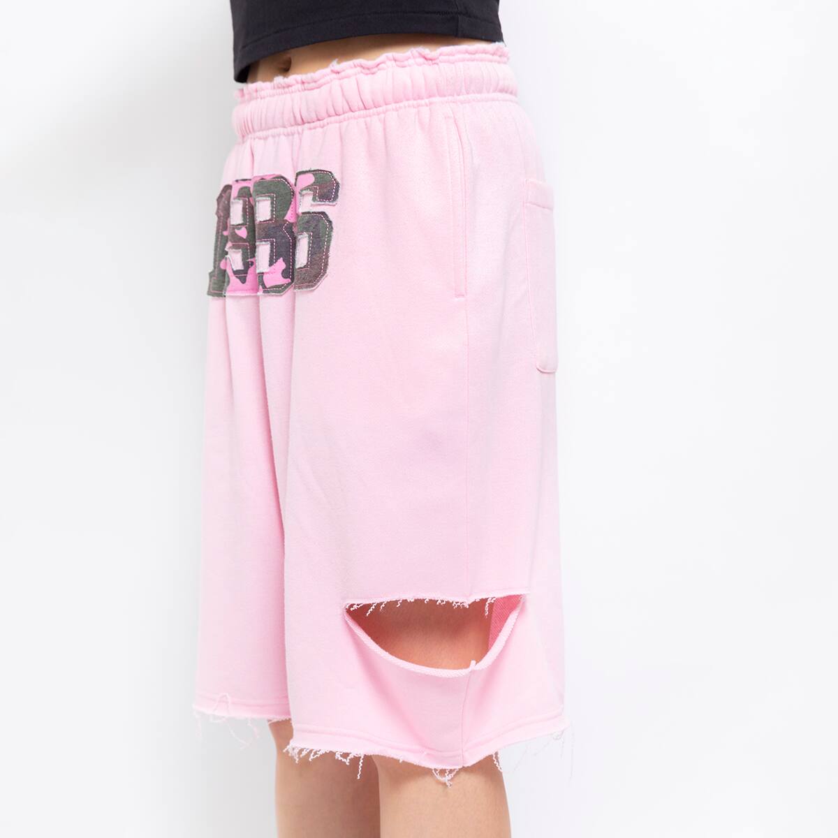 ATMOS PINK DAMAGED HALF SWEAT PANTS